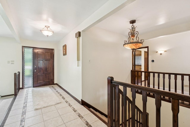 13115 Maple Rd, Mokena, IL 60448 - entryway with inlaid floor details and light tile patterned floors