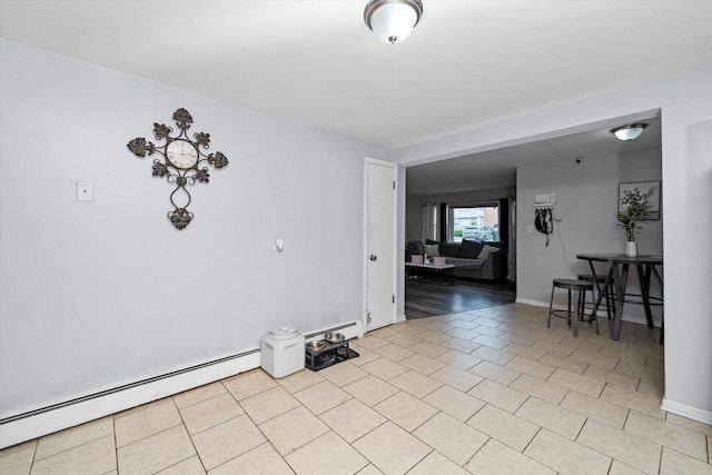 3827 Scoville Ave, Berwyn, IL 60402 - spare room with a baseboard heating unit and baseboards