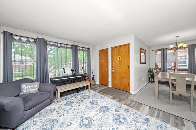 3827 Scoville Ave, Berwyn, IL 60402 - living room featuring a chandelier and wood finished floors