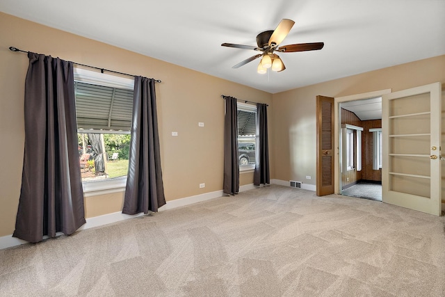 2125 Collett Ln, Flossmoor, IL 60422 - unfurnished bedroom with light colored carpet, ceiling fan, and french doors