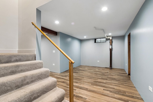 2125 Collett Ln, Flossmoor, IL 60422 - finished below grade area with wood finished floors, recessed lighting, and stairway