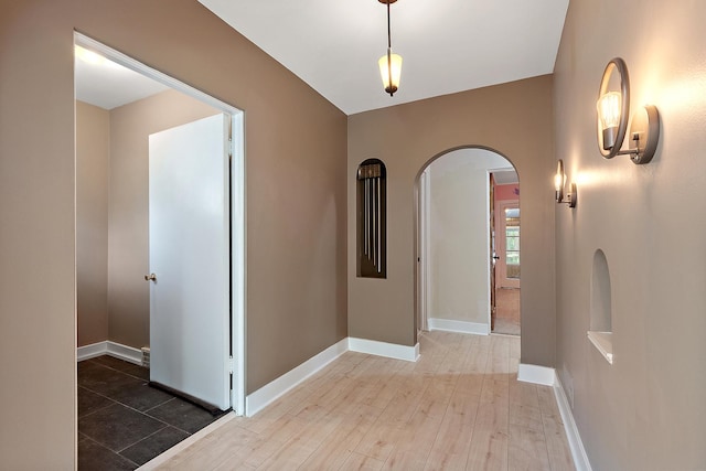 2125 Collett Ln, Flossmoor, IL 60422 - hall with arched walkways and wood finished floors