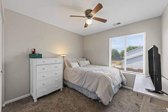 944 W Briarcliff Rd, Bolingbrook, IL 60440 - bedroom with dark colored carpet and a ceiling fan