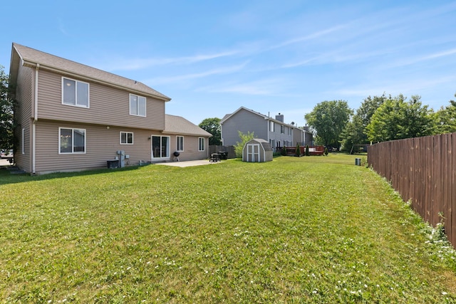 944 W Briarcliff Rd, Bolingbrook, IL 60440 - view of yard with a storage shed and a patio area