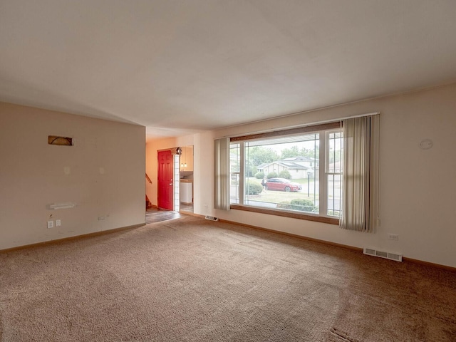 824 E 193rd Pl, Glenwood, IL 60425 - carpeted spare room featuring baseboards and stairway