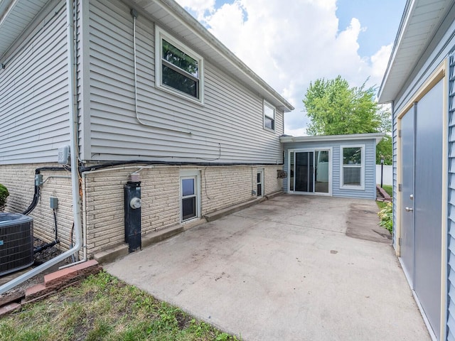 824 E 193rd Pl, Glenwood, IL 60425 - rear view of property with a patio area