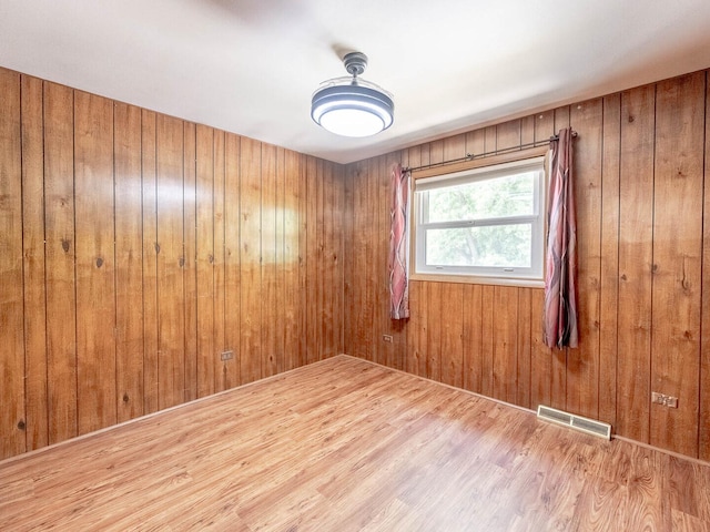 824 E 193rd Pl, Glenwood, IL 60425 - spare room featuring wood finished floors and wood walls