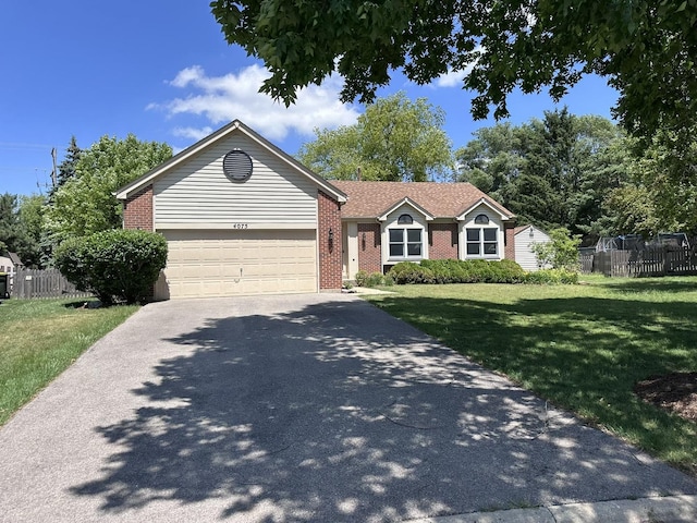4075 Peartree Dr, Lake In The Hills, IL 60156 - ranch-style home with asphalt driveway, brick siding, and an attached garage