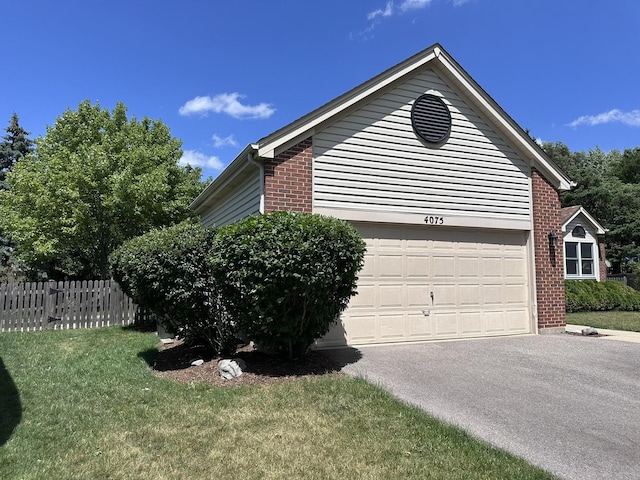 4075 Peartree Dr, Lake In The Hills, IL 60156 - view of property exterior with brick siding, driveway, and a garage