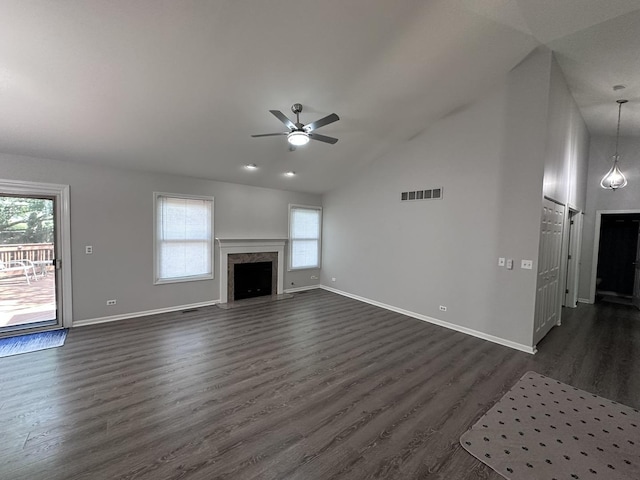 4075 Peartree Dr, Lake In The Hills, IL 60156 - unfurnished living room with plenty of natural light, dark wood finished floors, a ceiling fan, high vaulted ceiling, and a fireplace