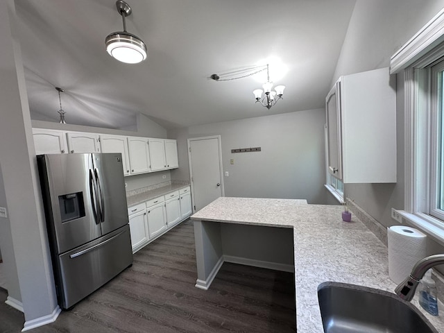4075 Peartree Dr, Lake In The Hills, IL 60156 - kitchen featuring stainless steel fridge, lofted ceiling, white cabinets, light countertops, and dark wood-style flooring