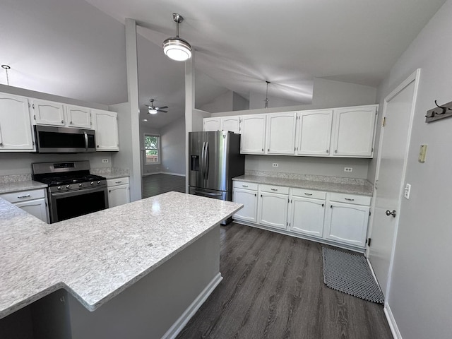 4075 Peartree Dr, Lake In The Hills, IL 60156 - kitchen featuring appliances with stainless steel finishes, vaulted ceiling, dark wood-style floors, white cabinets, and light countertops
