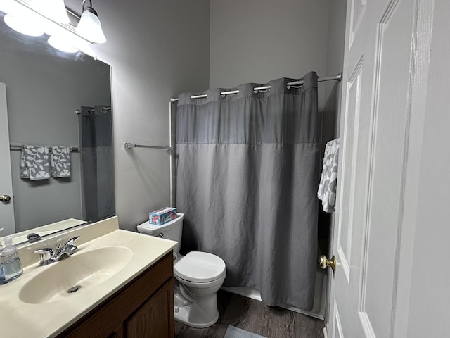 4075 Peartree Dr, Lake In The Hills, IL 60156 - full bathroom with wood finished floors, vanity, and curtained shower