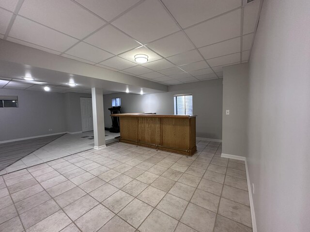 4075 Peartree Dr, Lake In The Hills, IL 60156 - basement with light tile patterned floors, a drop ceiling, and bar