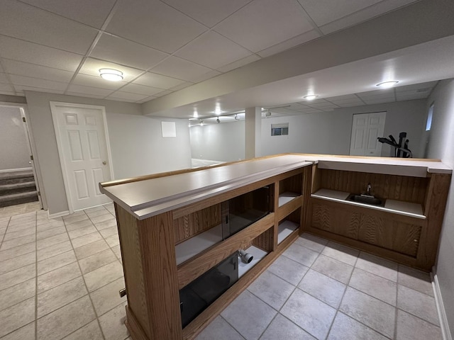 4075 Peartree Dr, Lake In The Hills, IL 60156 - kitchen with a drop ceiling, light tile patterned floors, and light countertops