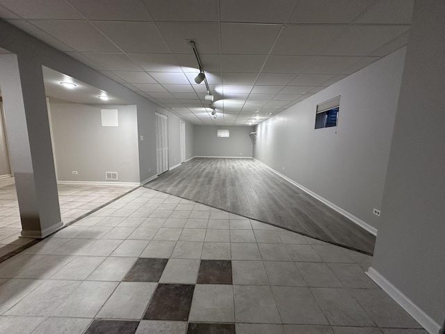 4075 Peartree Dr, Lake In The Hills, IL 60156 - finished basement with track lighting and tile patterned flooring