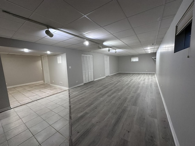 4075 Peartree Dr, Lake In The Hills, IL 60156 - finished basement with wood finished floors and a drop ceiling