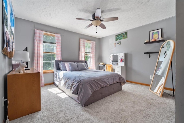 2903 Keystone Rd, Bloomington, IL 61704 - bedroom featuring a textured ceiling, carpet flooring, and ceiling fan