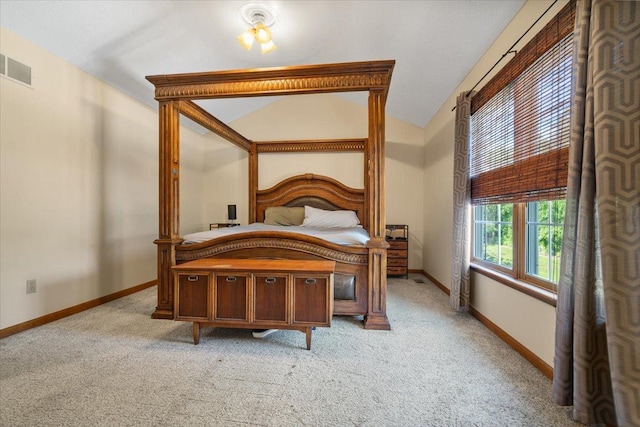 2903 Keystone Rd, Bloomington, IL 61704 - bedroom featuring light carpet and vaulted ceiling