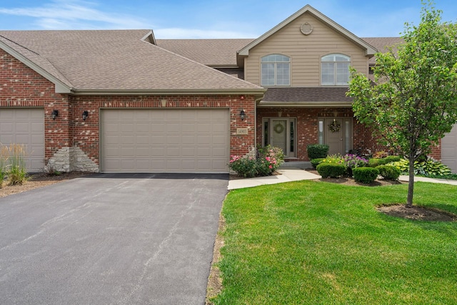 14903 S Preserve Dr, Lockport, IL 60441 - traditional home featuring roof with shingles, driveway, brick siding, and a garage