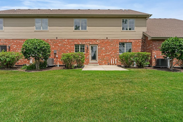 14903 S Preserve Dr, Lockport, IL 60441 - back of house with brick siding, a patio area, and a yard