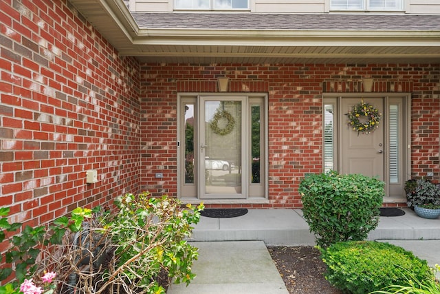 14903 S Preserve Dr, Lockport, IL 60441 - entrance to property featuring brick siding, a porch, and roof with shingles