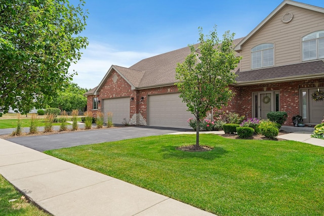 14903 S Preserve Dr, Lockport, IL 60441 - traditional-style home with brick siding, a garage, a front lawn, and driveway