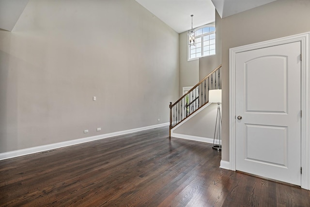 14903 S Preserve Dr, Lockport, IL 60441 - stairway with a chandelier, wood finished floors, and high vaulted ceiling