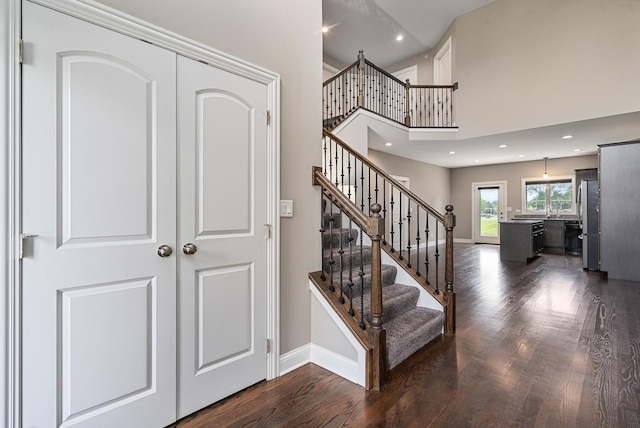 14903 S Preserve Dr, Lockport, IL 60441 - stairs featuring wood finished floors, recessed lighting, and a high ceiling