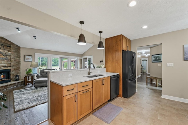 2911 E Oaks Rd N, Urbana, IL 61802 - kitchen featuring black refrigerator with ice dispenser, dishwasher, lofted ceiling, open floor plan, and light countertops