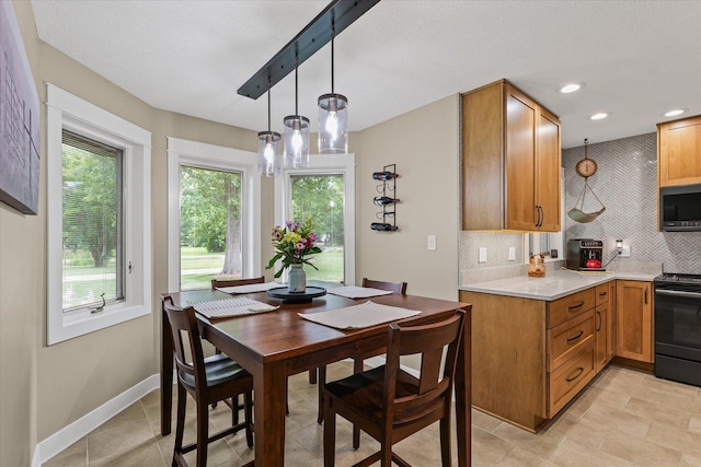 2911 E Oaks Rd N, Urbana, IL 61802 - dining area featuring recessed lighting and light tile patterned floors