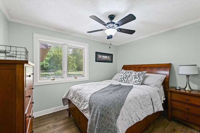 2911 E Oaks Rd N, Urbana, IL 61802 - bedroom featuring dark wood finished floors, a textured ceiling, crown molding, and a ceiling fan