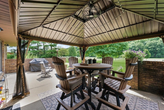 2911 E Oaks Rd N, Urbana, IL 61802 - view of patio / terrace featuring outdoor dining area, a grill, and a gazebo