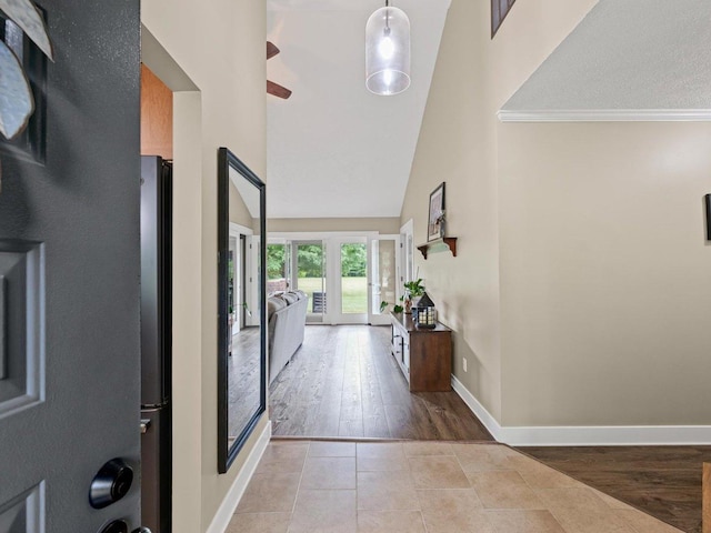 2911 E Oaks Rd N, Urbana, IL 61802 - foyer entrance featuring high vaulted ceiling, wood finished floors, french doors, and ornamental molding