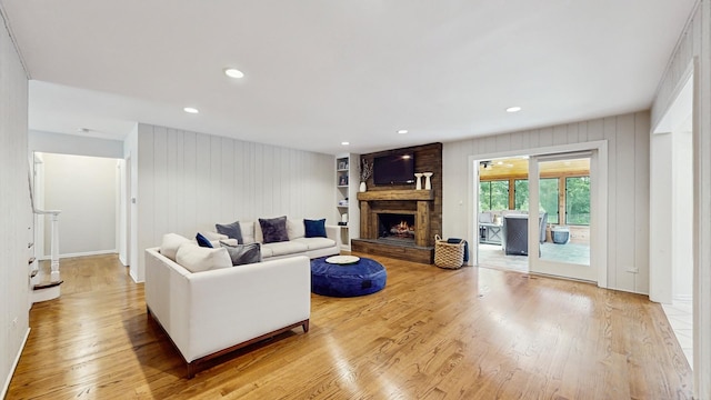 39 Keswick Ct, Lincolnshire, IL 60069 - living area with a fireplace, wood finished floors, recessed lighting, and wooden walls