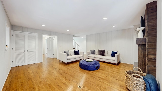 39 Keswick Ct, Lincolnshire, IL 60069 - living area with stairs, wood finished floors, a fireplace, and recessed lighting