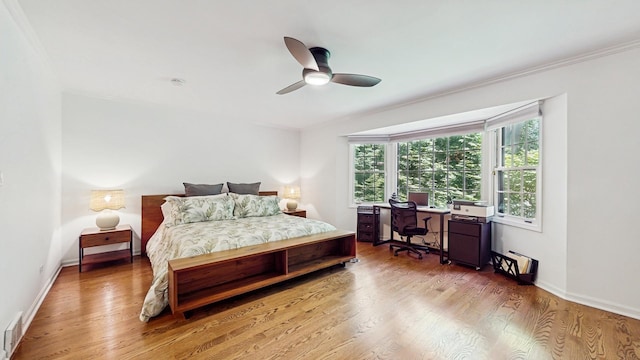 39 Keswick Ct, Lincolnshire, IL 60069 - bedroom featuring wood finished floors, a desk, a ceiling fan, and ornamental molding