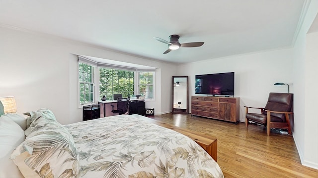 39 Keswick Ct, Lincolnshire, IL 60069 - bedroom with wood finished floors, crown molding, and a ceiling fan