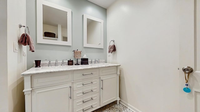 39 Keswick Ct, Lincolnshire, IL 60069 - bathroom featuring double vanity and baseboards