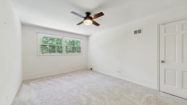 39 Keswick Ct, Lincolnshire, IL 60069 - empty room with a ceiling fan and carpet
