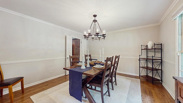 39 Keswick Ct, Lincolnshire, IL 60069 - dining area featuring a chandelier, wood finished floors, and ornamental molding