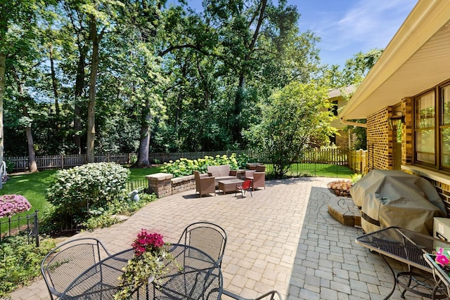 39 Keswick Ct, Lincolnshire, IL 60069 - fenced backyard with outdoor dining space, a patio area, and grilling area