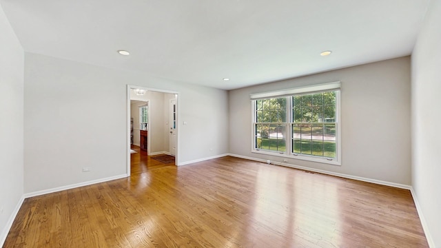 39 Keswick Ct, Lincolnshire, IL 60069 - unfurnished room with wood finished floors and recessed lighting
