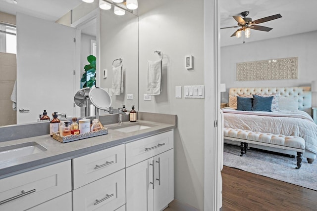 2140 W Armitage Ave Unit 3W, Chicago, IL 60647 - full bath with connected bathroom, double vanity, ceiling fan, and wood finished floors