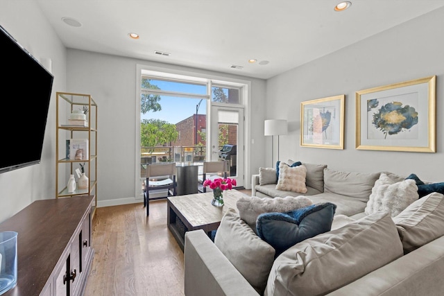 2140 W Armitage Ave Unit 3W, Chicago, IL 60647 - living room featuring light wood-style floors and recessed lighting