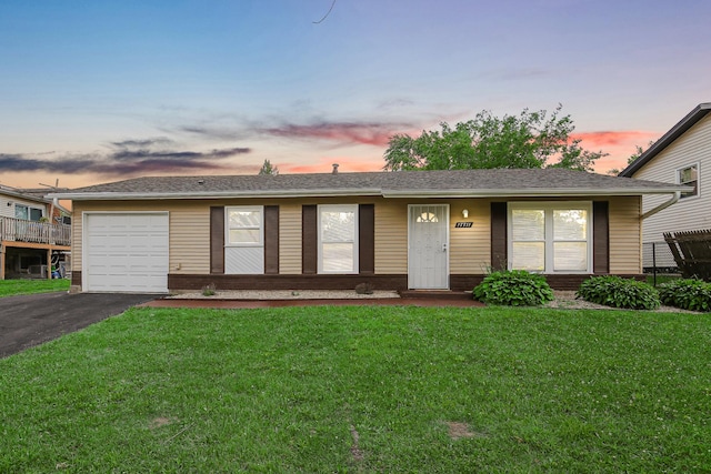 17711 Country Club Ln, Country Club Hills, IL 60478 - single story home featuring a yard, asphalt driveway, an attached garage, and brick siding