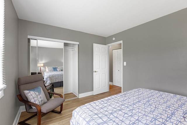 17711 Country Club Ln, Country Club Hills, IL 60478 - bedroom featuring light wood finished floors and a closet