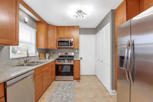 17711 Country Club Ln, Country Club Hills, IL 60478 - kitchen featuring appliances with stainless steel finishes and brown cabinets