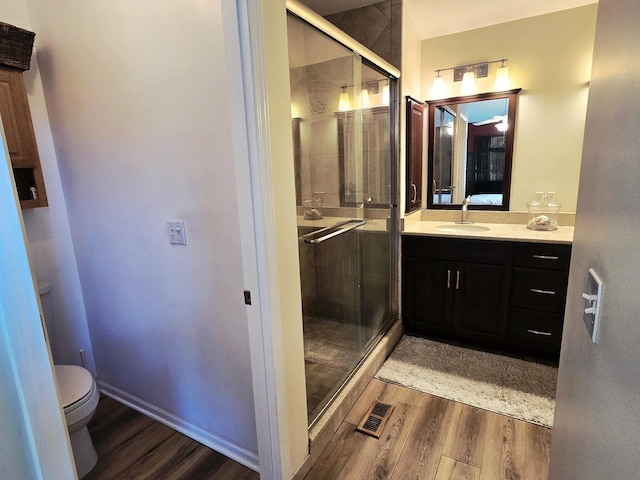 1873 Baldwin Way, Bolingbrook, IL 60490 - bathroom featuring wood finished floors, a shower stall, and vanity