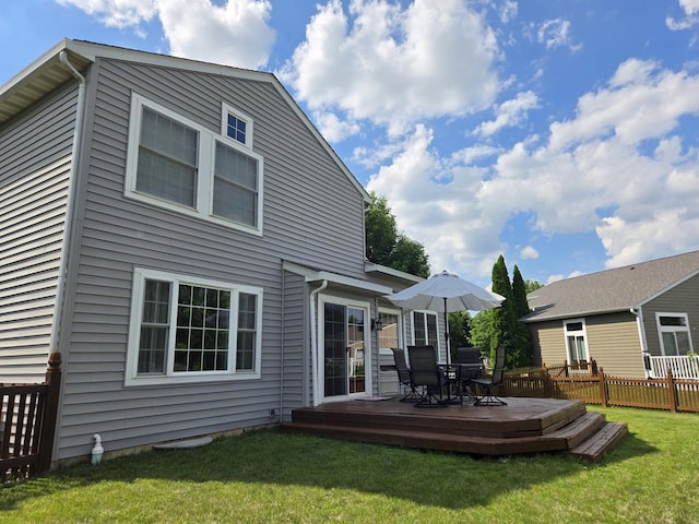 1873 Baldwin Way, Bolingbrook, IL 60490 - rear view of property with a deck, a yard, and outdoor dining area